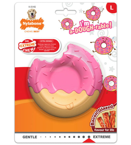 Pink Nylabone dog chew toy with bacon flavor, designed for dogs to chew and chew-resistant for durable play.