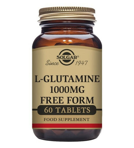 Solgar L-glutamine supplement bottle in a health and personal care setting, showing the product label and packaging.