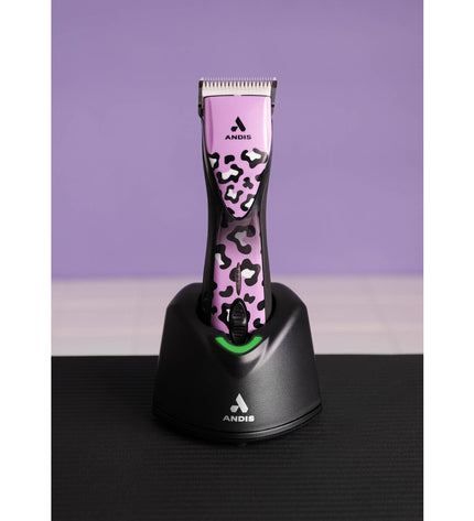 Andis Pulse ZR II Wild black and purple pet hair clipper for dogs, close-up of blades and colorful body.