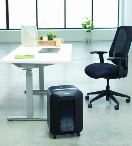 Fellowes LX85 paper shredder with black body, showing paper slots and control panel for office paper shredding.
