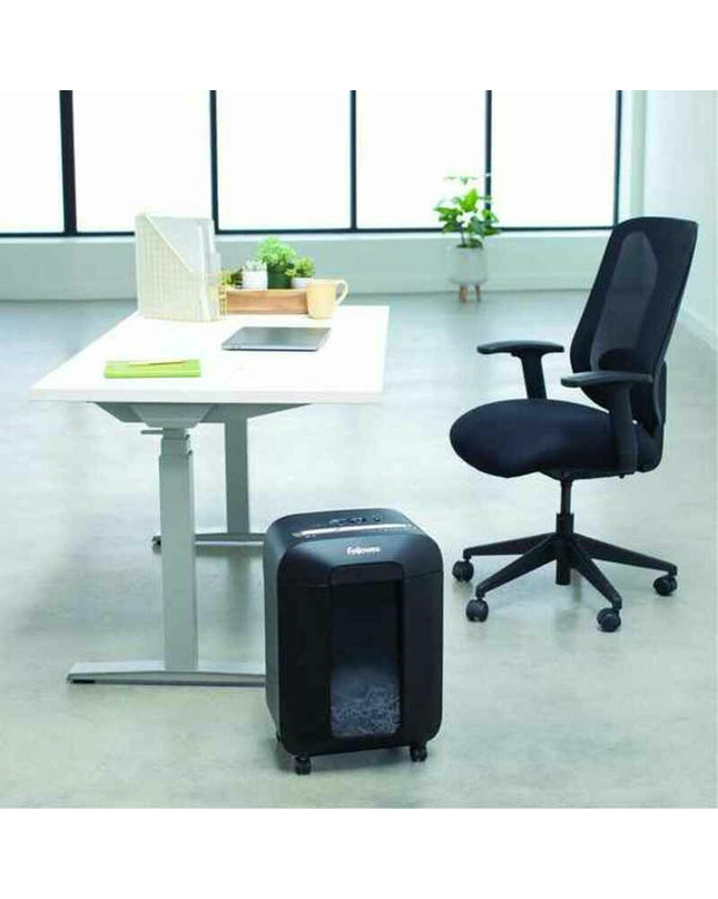 Fellowes LX85 paper shredder with black body, showing paper slots and control panel for office paper shredding.