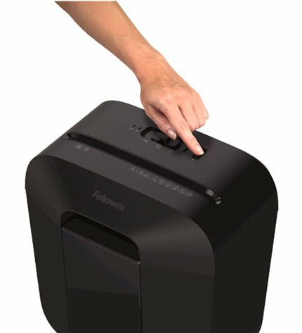 Fellowes LX25 paper shredder for office use, compact design with metal and plastic parts, ready to shred documents securely.