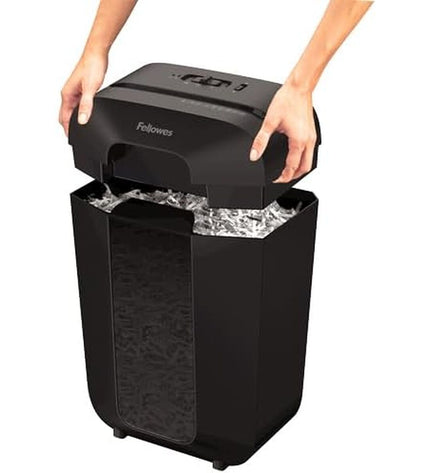 Fellowes Powershred LX70 paper shredder for office use, showing its compact design and shredding slot in a professional setting.