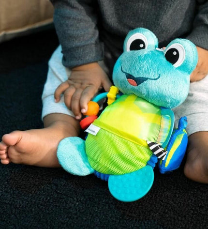 Baby Einstein Ocean Explorers Neptune soft activity toy for babies, made of white plastic with ocean-themed design.