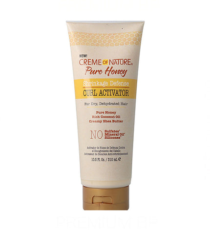 Creme Of Nature Pure Honey Conditioner for defined curls, 310ml, in a white bottle with a flip-top cap.