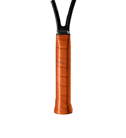 Wilson tennis grip WR8403301 for outdoor sports, showing the black textured surface and Wilson branding on the grip.