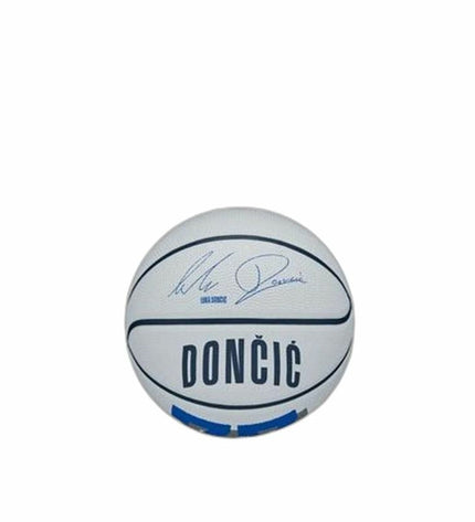 Wilson Luka Wit size 3 basketball showing the textured surface and Wilson logo on a sports outdoor court.