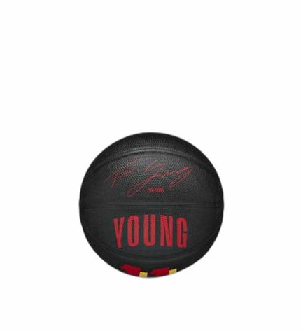 Wilson Trae Zwart basketball, size 3, designed for outdoor sports, showing black textured surface with Wilson branding.