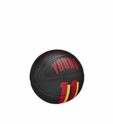 Wilson Trae basketball size 3 in black, designed for sports and outdoor play, featuring a textured surface for grip.