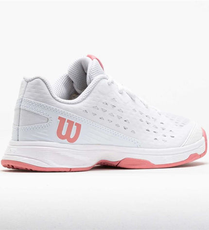 Wilson Rush Pro kids' tennis paddel shoes in white, sporty design with supportive features for outdoor tennis play.
