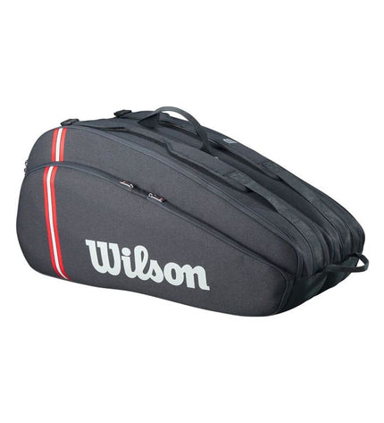Wilson Tour tennis rackettas, black 12-pack, sport and outdoor tennis equipment, showing rackets with black frames and grips.