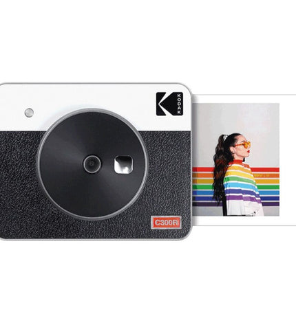 Kodak C300RY digital camera with compact design, lens, and control buttons, ideal for photography and videography in electronics.