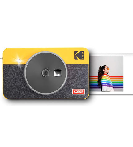 Kodak C210RY digital camera with compact design, featuring a lens, buttons, and display screen for photography and video recording.