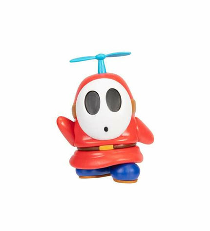 Jakks Pacific Babypop toy, 10 cm tall, featuring colorful clothing and detailed facial features, in a playful pose.