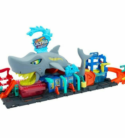 Colorful Mattel race track toy with multiple lanes and racing cars, designed for children to enjoy exciting vehicle races.