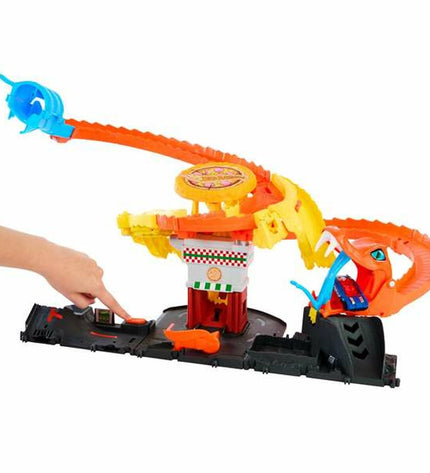 Mattel race track toy with colorful roads and racing cars on a play mat, designed for children’s racing and vehicle play.
