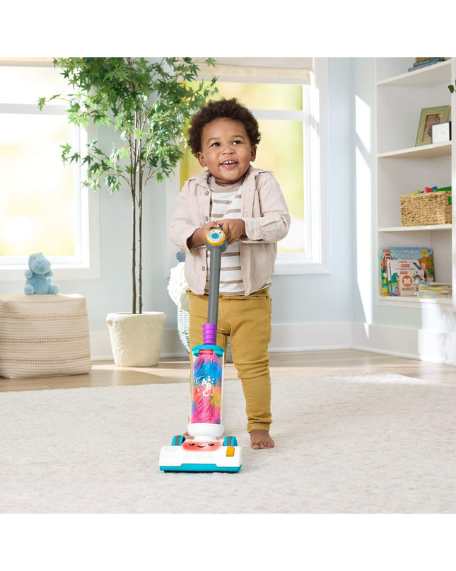 Fisher-Price toy vacuum cleaner, pretend play cleaning toy for kids, with colorful buttons and realistic design.