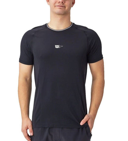 Black Wilson men's sport T-shirt with short sleeves and seamless crew neck, designed for tennis and outdoor activities.