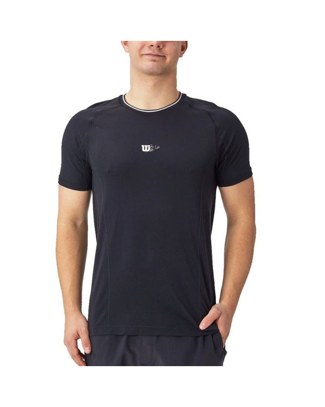 Black Wilson men's sport T-shirt with short sleeves and seamless crew neck, designed for tennis and outdoor activities.