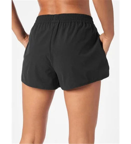 Wilson women's sport shorts for tennis and padel, lightweight athletic shorts with a comfortable fit, ideal for outdoor sports.