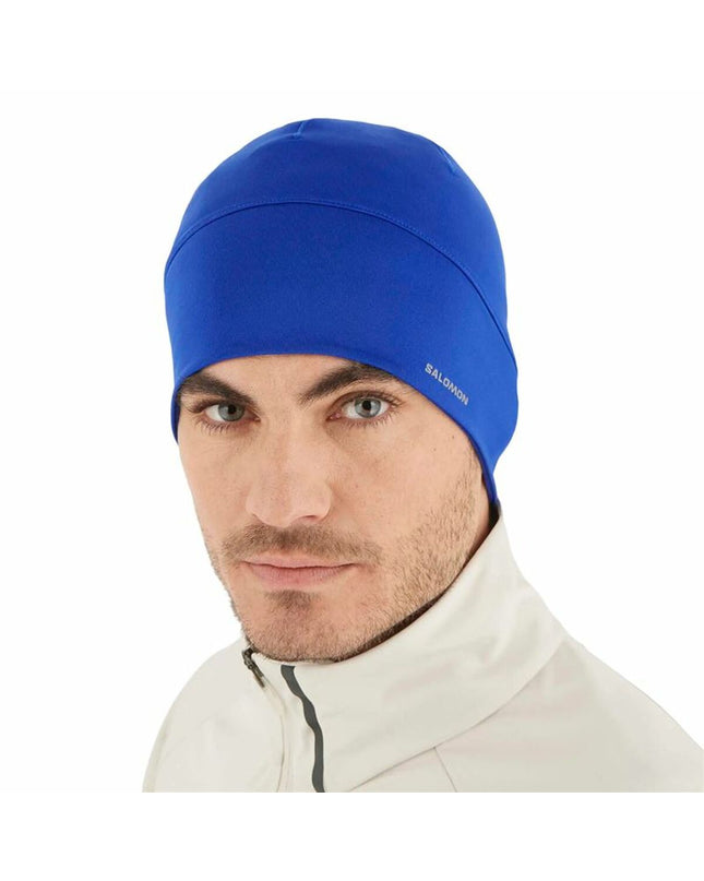 Salomon Active Surf The Web/Reflect blue wetsuit cap for watersport and outdoor activities, designed for comfort and sun protection.