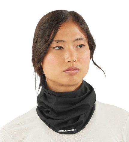 Salomon Cross NeckHead Tube in black, a versatile sport and outdoor neck warmer, suitable for camping and hiking activities.
