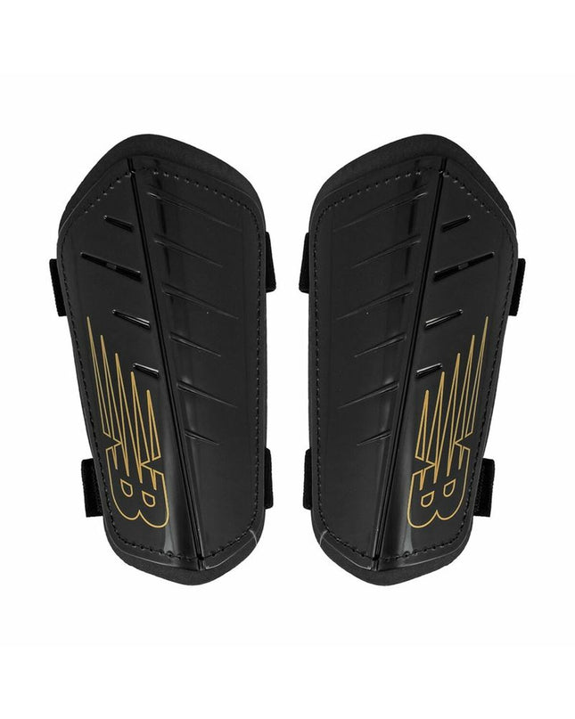 Black New Balance Nclasp Flex football shin guards with adjustable straps, designed for sport and outdoor soccer protection.