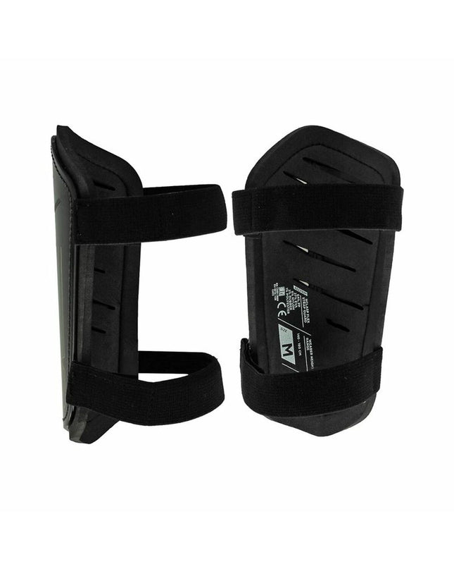 Black New Balance Nclasp Flex football shin guards with protective padding and adjustable straps, designed for sport and outdoor use.