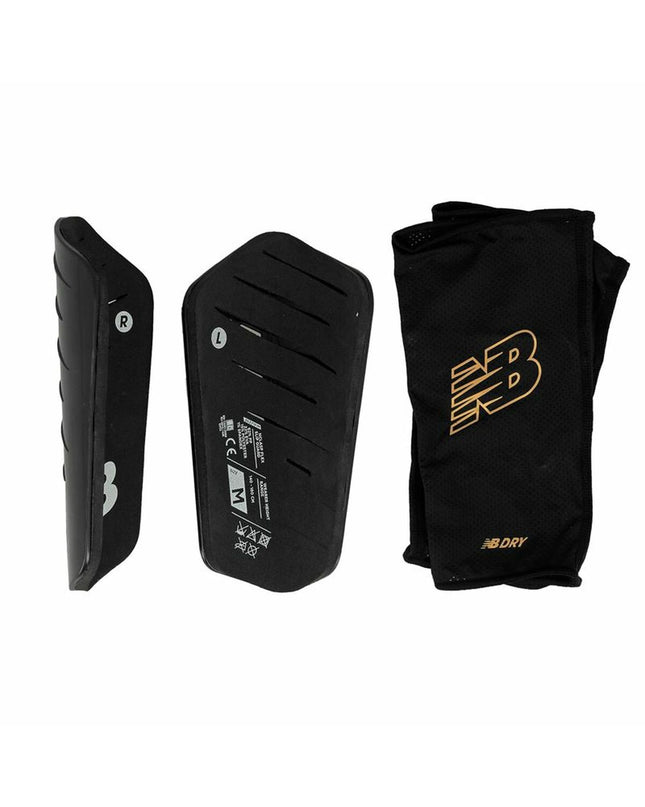 Black New Balance Nclasp Flex soccer shin guards with adjustable straps and protective padding for football players.