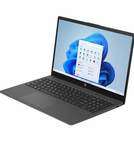 HP fd0064nf 15.6-inch laptop with 8GB RAM and 256GB SSD, showing the sleek silver design and keyboard.