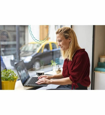 Lenovo IdeaPad 3 14-inch laptop with Intel Core i3, 8GB RAM, and 128GB SSD, shown from a side angle.
