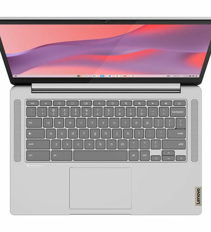 Lenovo IdeaPad 3 14-inch laptop with 8GB RAM and 128GB LCD display, shown from a side angle on a desk.