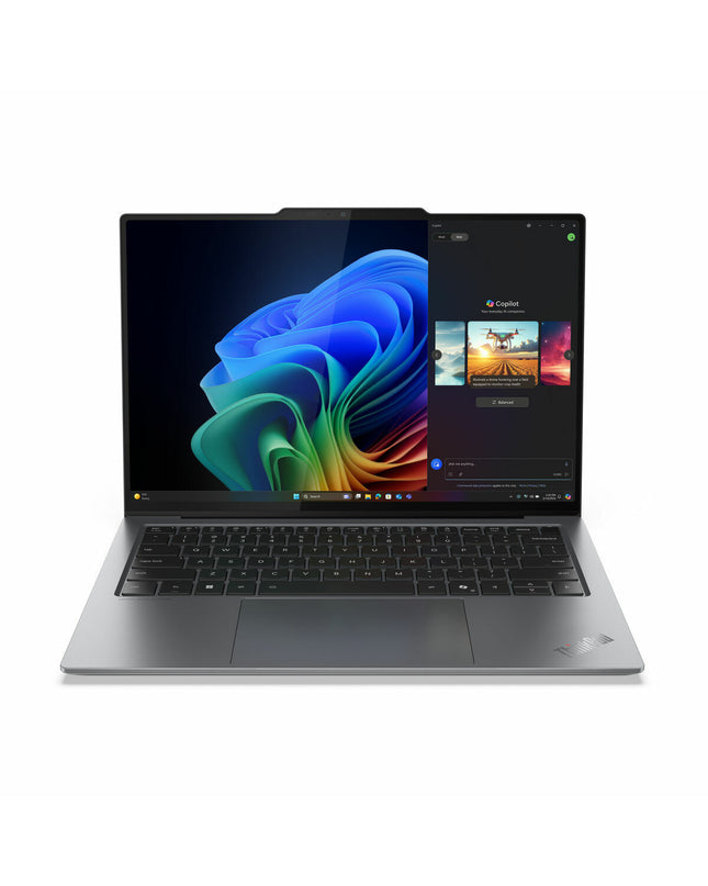 Lenovo 14-inch laptop with Qwerty Spanish keyboard, 512GB SSD, sleek design, shown open with screen and keyboard visible.