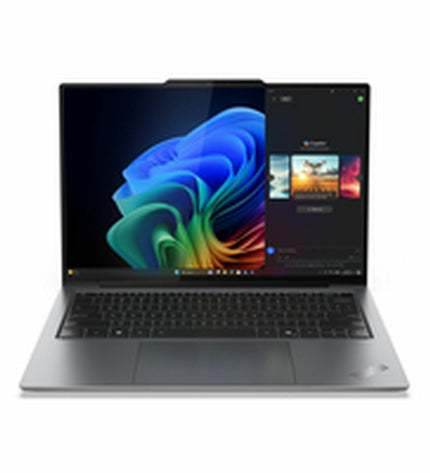 Lenovo 14-inch laptop with QWERTY keyboard, 512GB SSD, Spanish language layout, sleek design, and open screen showing keyboard and ports.