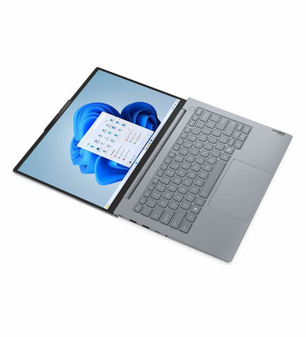 Lenovo 14-inch laptop with Intel Core Ultra 5, 16GB RAM, 512GB SSD, QWERTY Spanish keyboard, sleek design.