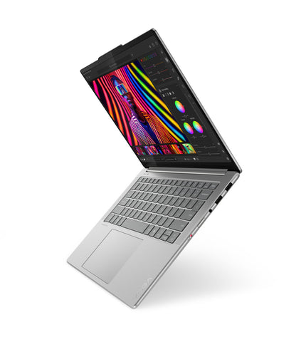 Lenovo 14.5-inch laptop with QWERTY Spanish keyboard, 1TB SSD, lightweight design, shown from a side angle.