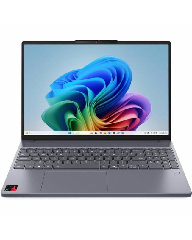 Lenovo 15.3-inch laptop with 16 GB RAM and 512 GB SSD, open on a desk showing keyboard and screen display.