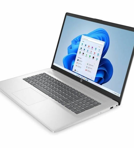 HP 17-CN3013NF laptop with 17.3-inch display, Intel Core i3 N305, 8GB RAM, 512GB SSD, shown from the side angle.