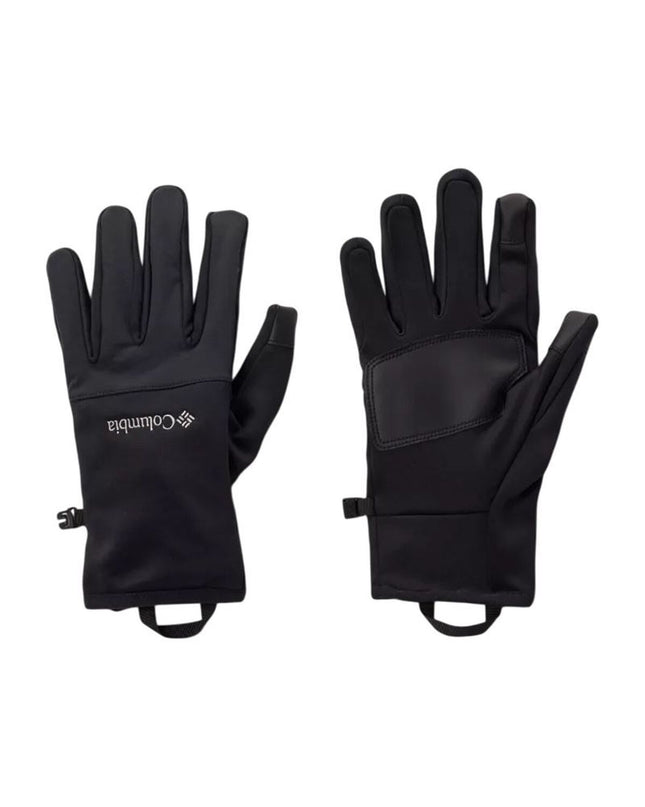 Black Columbia outdoor gloves designed for sport, camping, and hiking, shown on a person's hands in a natural outdoor setting.