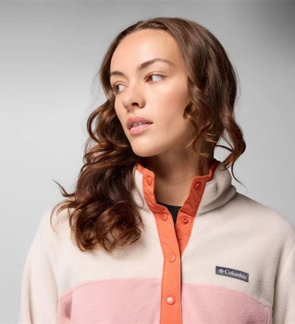 Columbia Benton Springs fleece vest with half snap zipper, designed for outdoor activities and camping, featuring soft fleece lining.