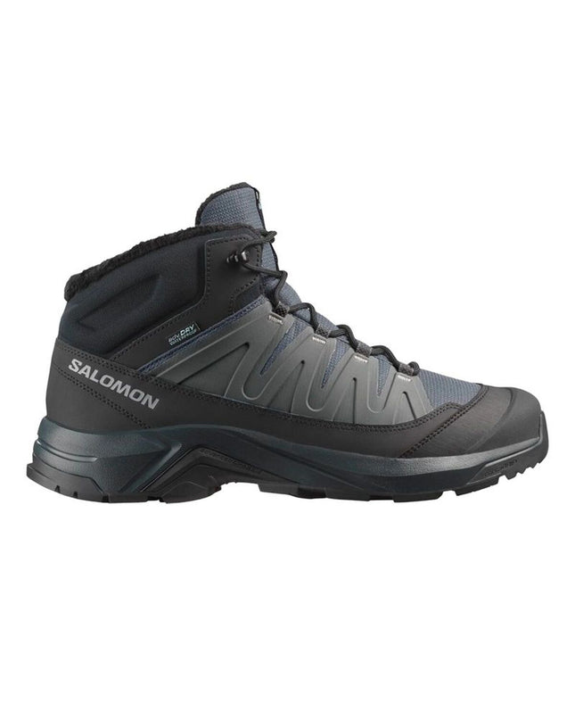 Salomon X-Adventure Coldrush WP football boots for kids, sport and outdoor footwear, black with red accents, close-up view.