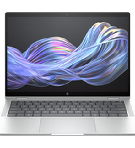 HP B69A2ET 14-inch laptop with Intel Core Ultra 5, 16GB RAM, and 512GB SSD, showing the sleek silver design and keyboard.