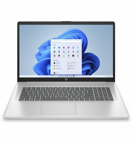 HP laptop for calculation with sleek design and keyboard, showing the HP logo and screen display in a modern workspace.