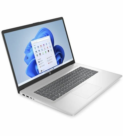 HP laptop used for calculations, shown with sleek design and keyboard, ideal for productivity and computing tasks.