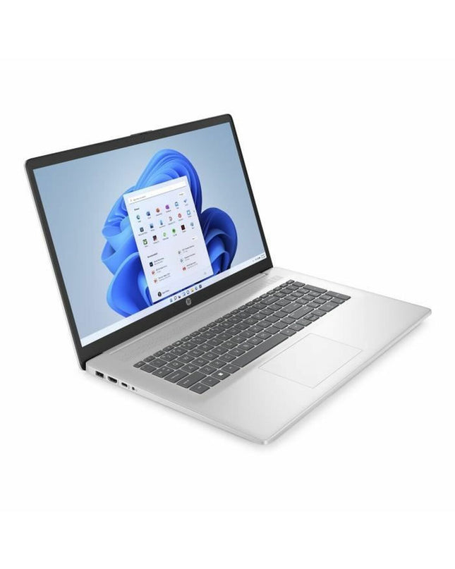 HP laptop used for calculations, shown with sleek design and keyboard, ideal for productivity and computing tasks.