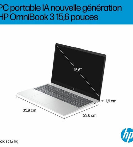 HP laptop used for calculations, showing a sleek design with keyboard and screen, ideal for computing tasks.