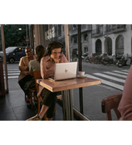 HP AD2Z8ET 13.3-inch laptop with Intel Core Ultra 5, 16GB RAM, and 512GB SSD, shown with sleek design and display screen