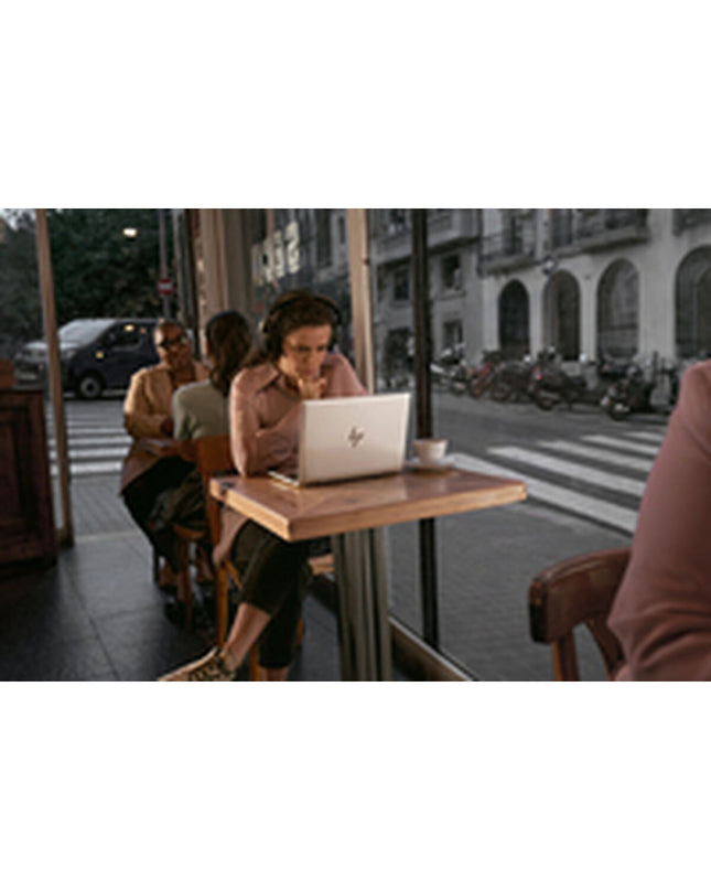 HP AD2Z8ET 13.3-inch laptop with Intel Core Ultra 5, 16GB RAM, and 512GB SSD, shown with sleek design and display screen