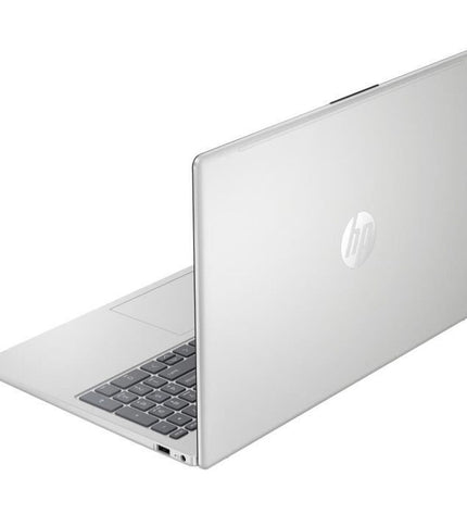 HP laptop for calculations with a sleek design, shown with keyboard and screen in a professional workspace setting.