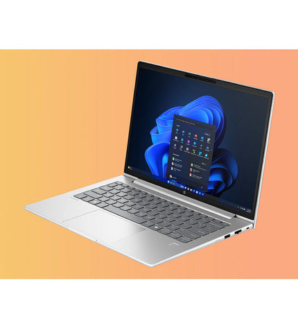HP CQ0D4ET 14-inch laptop with Intel Core Ultra 5, 32GB RAM, and 1TB SSD, shown with sleek design and keyboard.